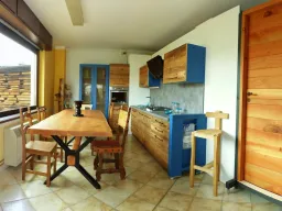 cucina con tavolo massello